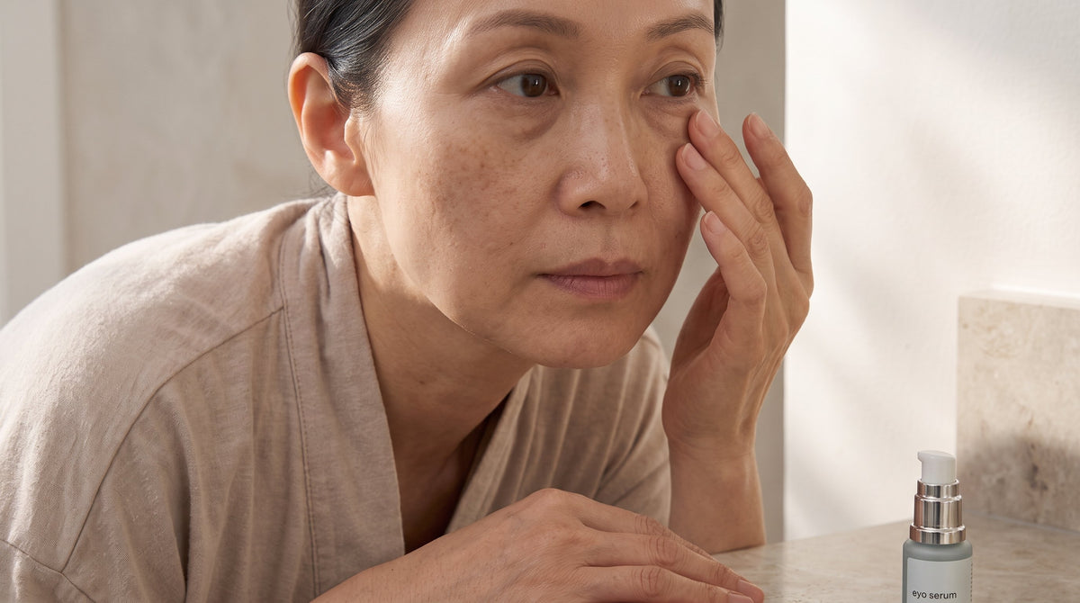 Close-up of under-eye skin showing natural texture and fine lines in soft light