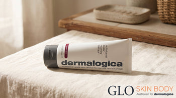 Dermalogica Multivitamin Power Recovery Masque tube on a soft cream surface in warm morning light